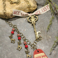 Load image into Gallery viewer, The Primitive Peddler Ticket To The North Pole Charm'd Necklace