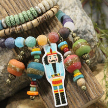Load image into Gallery viewer, The Primitive Peddler Nutcrackers On Parade Charm'd Stretch Bracelet Set