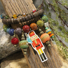 Load image into Gallery viewer, The Primitive Peddler Nutcracker Parade Charm&#39;d Stretch Bracelet Set
