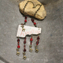 Load image into Gallery viewer, The Primitive Peddler Up On A Rooftop Dangle Drop Reindeer Necklace
