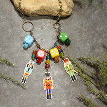 Load image into Gallery viewer, The Primitive Peddler Nutcrackers Game Day Charm&#39;d Necklace
